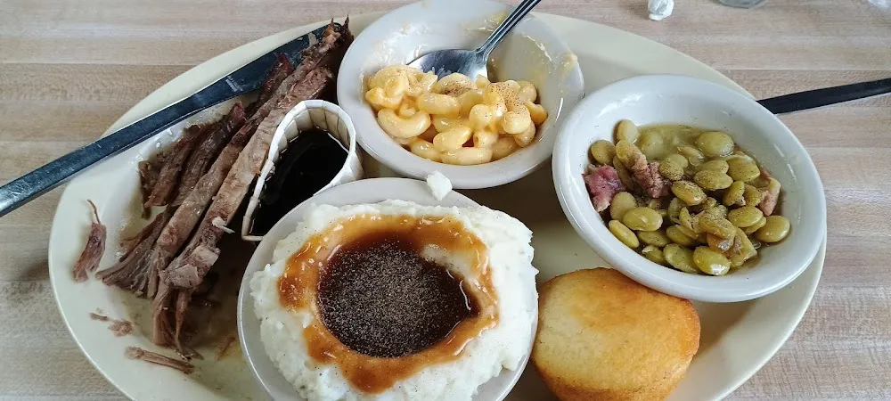 Brisket with Mashed Potatoes and Gravy Macaroni and Cheese and Lima Beans